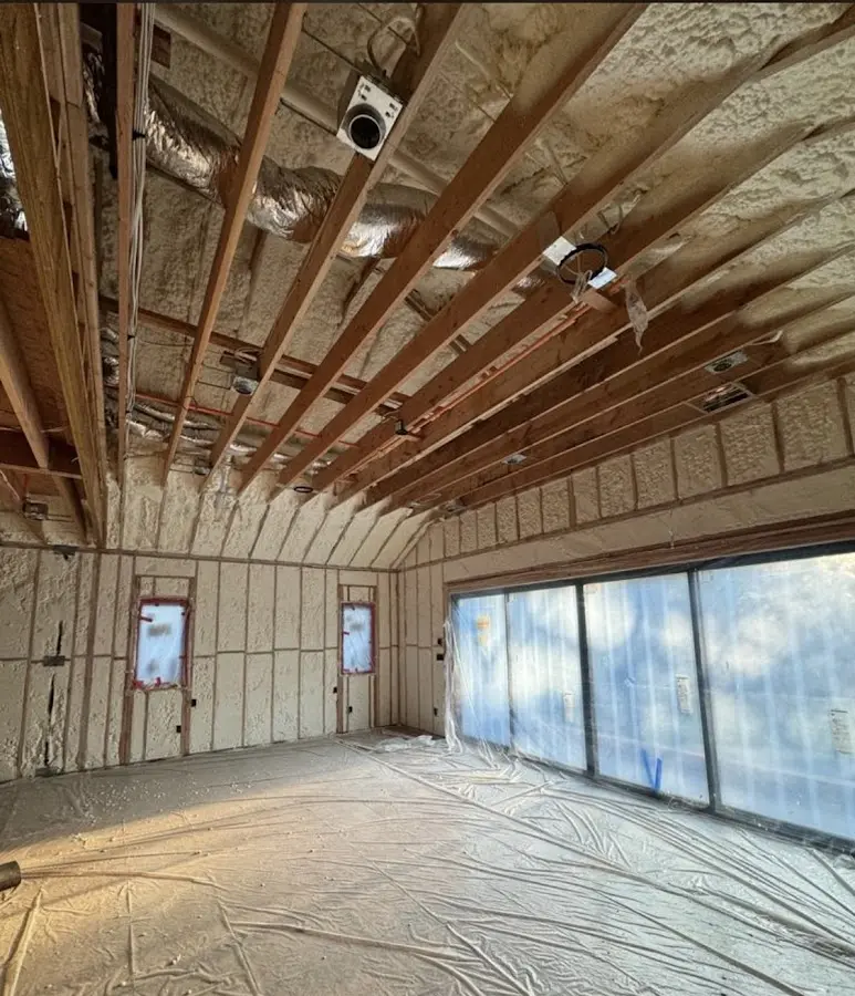 Interior walls and ceiling insulated with spray foam during new construction in South Gate
